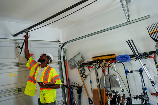 Professional Garage Door Panel Replacement technician working in Bluffton, IN